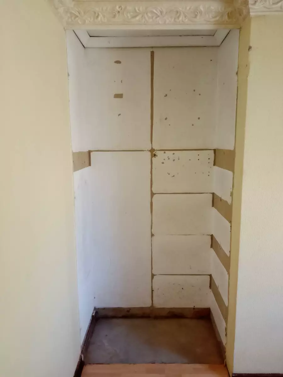 Recessed alcove under construction with drywall panels