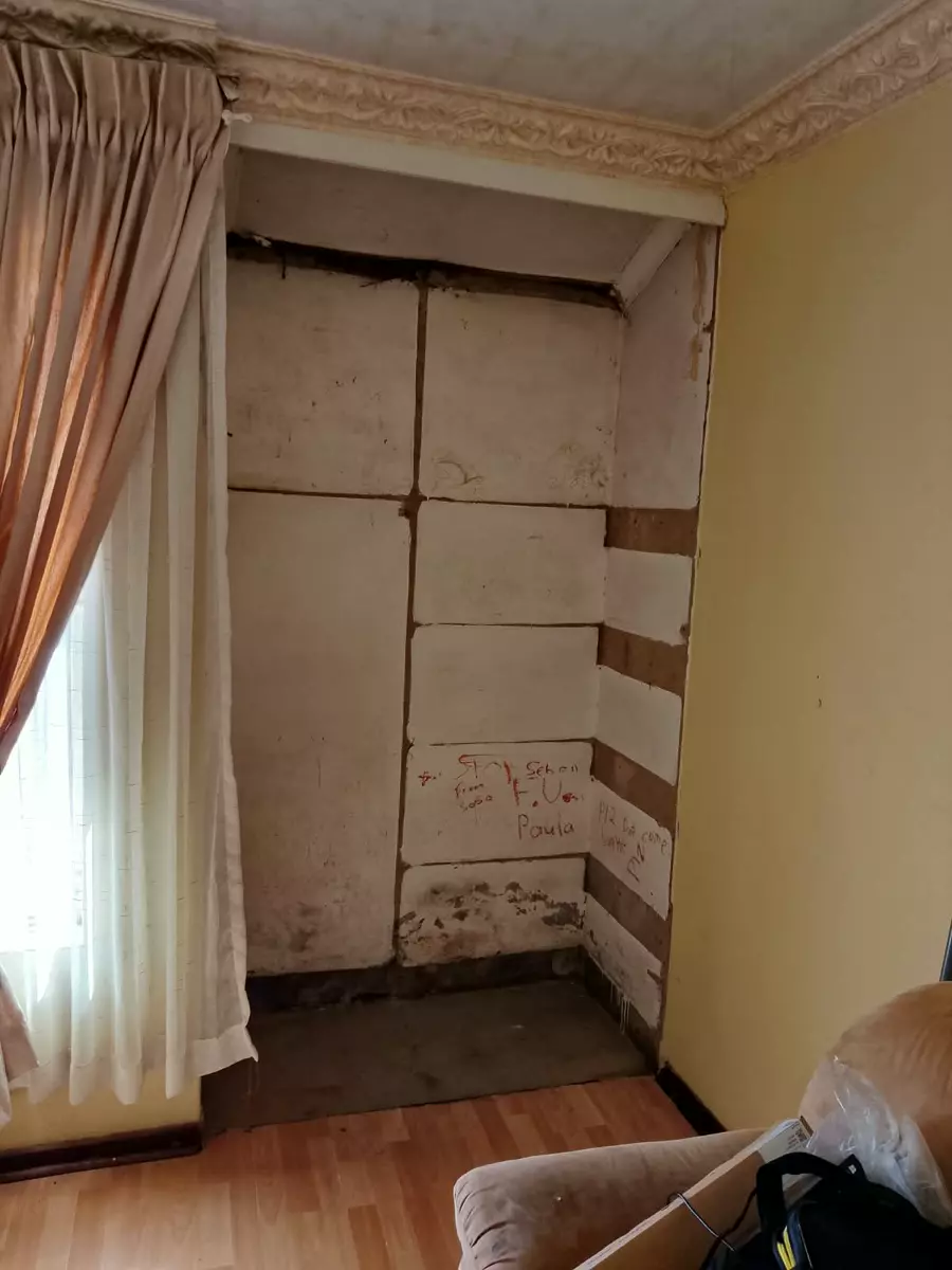 Interior room with a recessed alcove during renovation